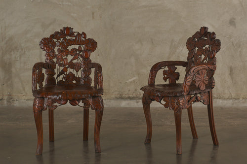 PAIR OF ITALIAN 'STILE LIBERTY' CARVED WALNUT ARM CHAIRS
